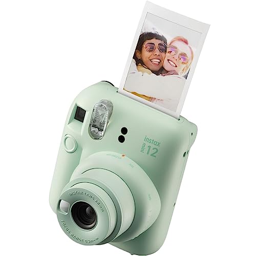 Instax Mini 12 Instant Camera with Accessory Bundle, Custom Case, 50 Sheets Film, Clay White Photo Album H58415