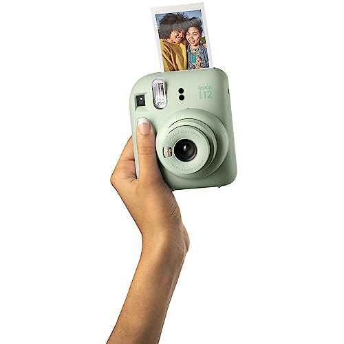 Instax Mini 12 Instant Camera with Accessory Bundle, Custom Case, 50 Sheets Film, Clay White Photo Album H58415